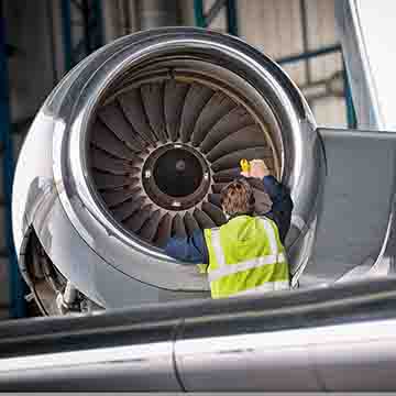 Inspection of an aircrafts engine at a fixed base operation