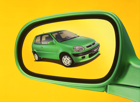 Honda Logo Car in a mirror