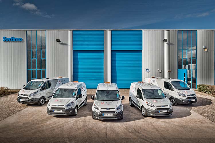A group of vans photographed for a companies annual report
