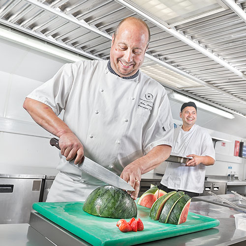 Photograph of a chef in a commercial kitchen in Central London