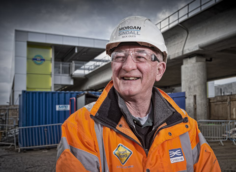 Portrait of a construction worker at a London DLR station