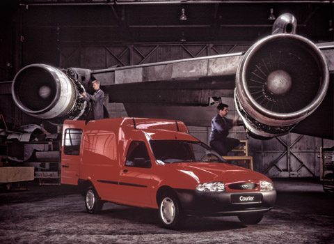 Technicians cheking aircraft engines at Southend airport in Essex