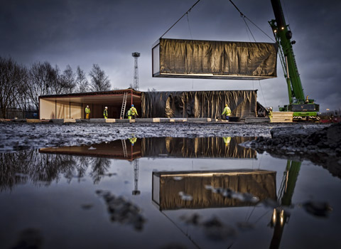 Portable building being craned ito possition in Manchester