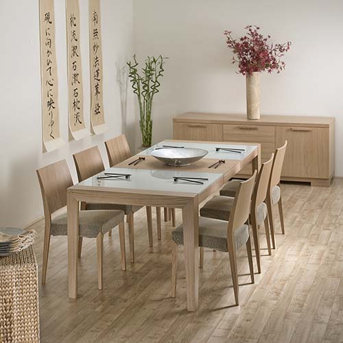 Oriental style dining room furniture in a light wood.