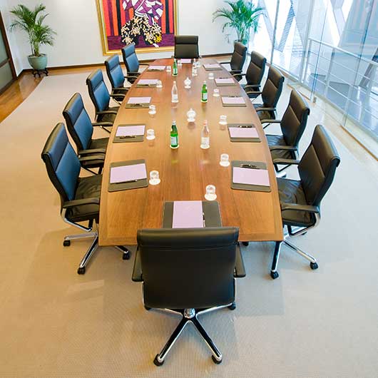 Office in The Gherkin Building in London showing a large table in the boardroom