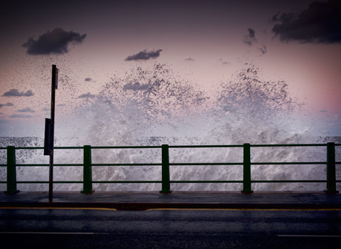 Wave hitting the seawall at Sandsend, North Yorkshire