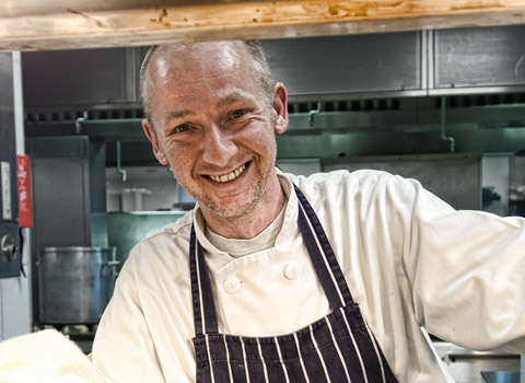 Chef photographed in a kitchen