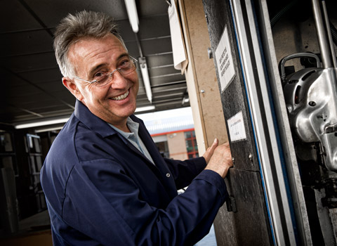 Man photographed in an industrial location