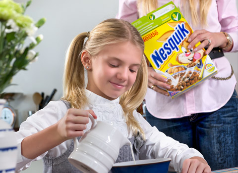 Girl eating cereal for advertising photography