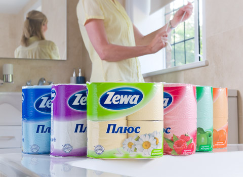 Products photographed in a bathroom with a model