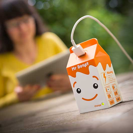 A power pack being used by a young woman in a garden