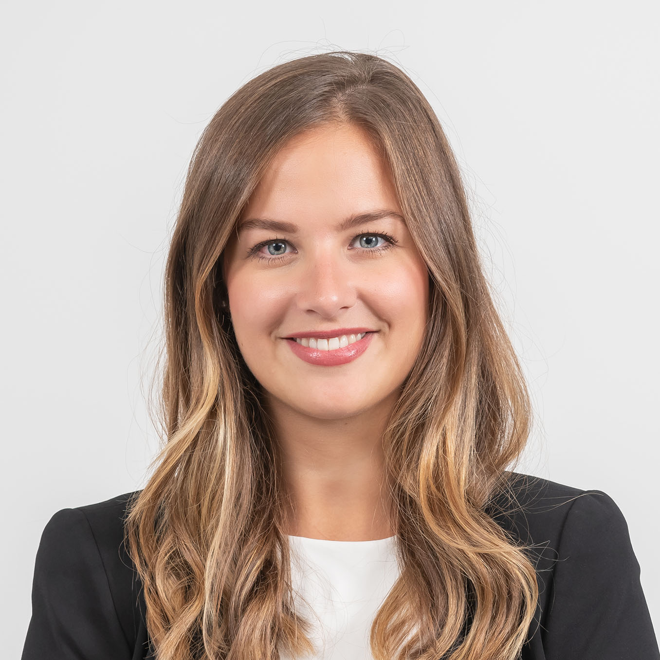 Corporate portrait of a young women photographed in a London office