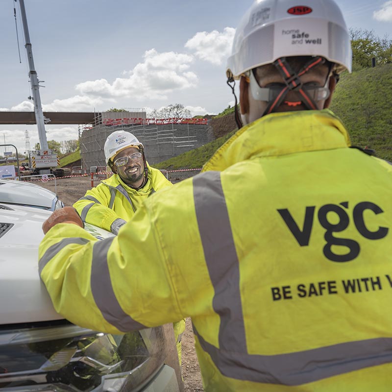 Workers in orange hi-viz on a railway